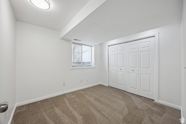 696 W 1275 N, Farmington, UT 84025 - unfurnished bedroom with carpet floors, baseboards, and a closet