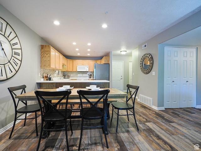 1230 E Privet Dr Unit 214, Salt Lake City, UT 84121 - dining space featuring dark wood finished floors, baseboards, and recessed lighting