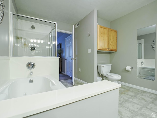 1230 E Privet Dr Unit 214, Salt Lake City, UT 84121 - full bath with an enclosed shower, toilet, baseboards, a whirlpool tub, and vanity