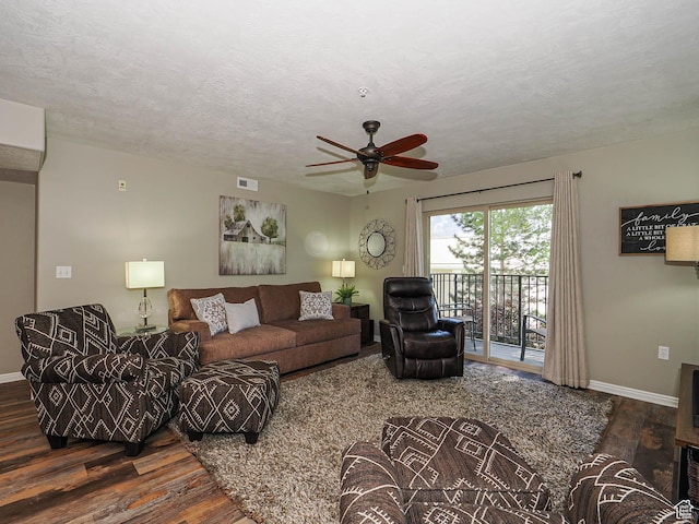 1230 E Privet Dr Unit 214, Salt Lake City, UT 84121 - living area featuring wood finished floors, baseboards, a ceiling fan, and a textured ceiling