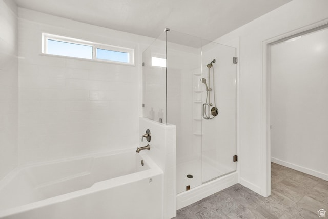 8813 S Bornite Rd, West Jordan, UT 84081 - full bath featuring a washtub, baseboards, and a shower with shower door