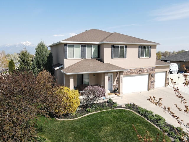 8813 S Bornite Rd, West Jordan, UT 84081 - view of front of property with stucco siding, driveway, fence, and roof with shingles