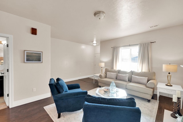 8813 S Bornite Rd, West Jordan, UT 84081 - living room with wood finished floors, visible vents, and baseboards
