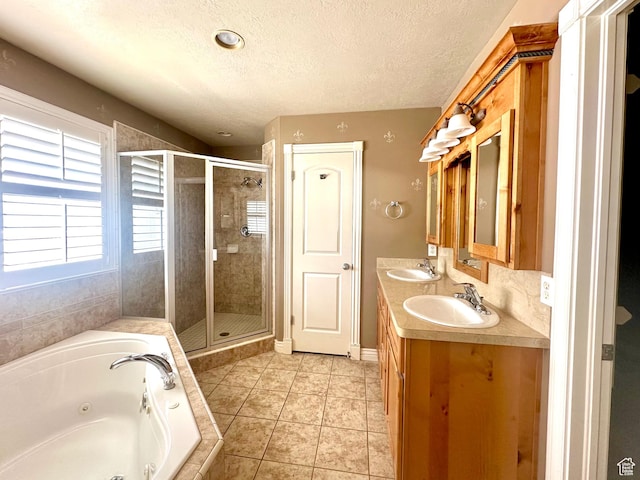 3427 N 2500 W, Farr West, UT 84404 - full bath with a tub with jets, a shower stall, and a sink