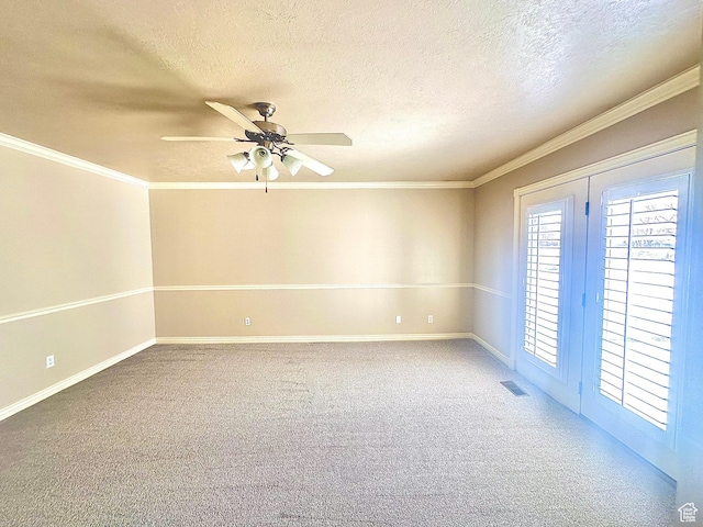 3427 N 2500 W, Farr West, UT 84404 - spare room featuring visible vents, carpet flooring, crown molding, baseboards, and ceiling fan