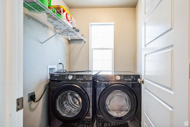 5731 W Osprey Dr, Stansbury Park, UT 84074 - laundry room featuring washing machine and dryer