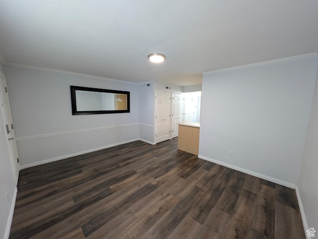 577 N 100 W Unit 102, Provo, UT 84601 - spare room with dark wood-style flooring, crown molding, and baseboards