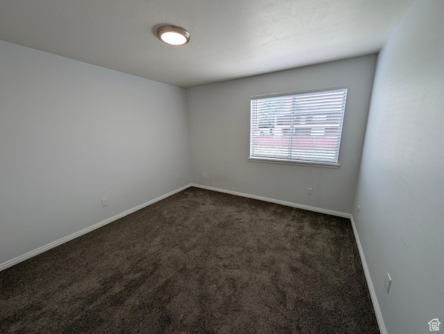 577 N 100 W Unit 102, Provo, UT 84601 - empty room featuring baseboards and dark carpet