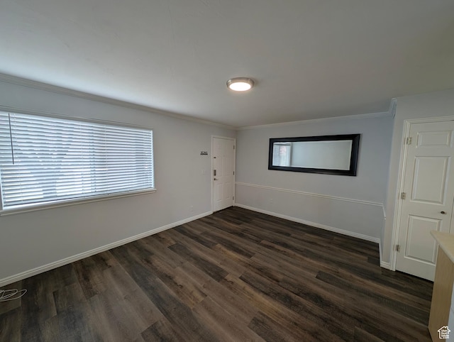 577 N 100 W Unit 102, Provo, UT 84601 - empty room with baseboards, dark wood-style floors, and crown molding
