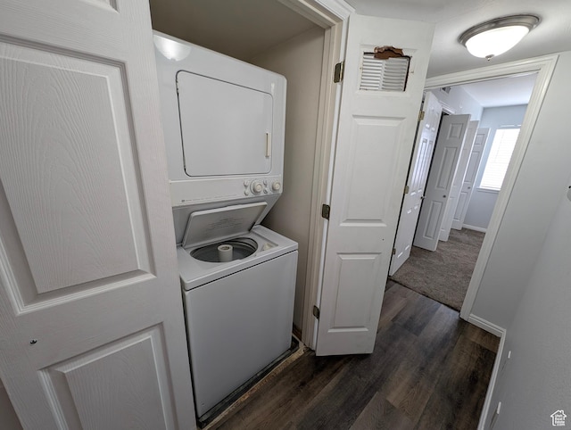 577 N 100 W Unit 102, Provo, UT 84601 - laundry area with stacked washer and dryer, dark wood-style floors, baseboards, and laundry area