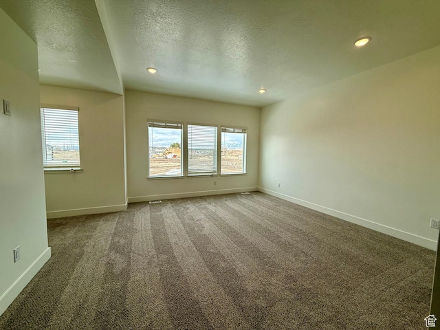 3366 S 1010 W, Nibley, UT 84321 - empty room featuring carpet flooring, recessed lighting, a textured ceiling, and baseboards