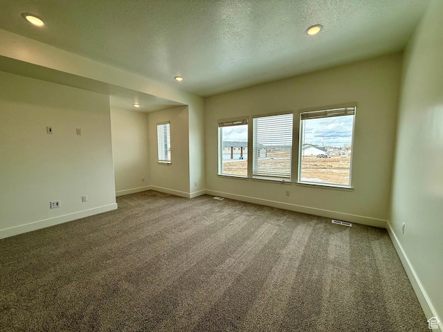 3366 S 1010 W, Nibley, UT 84321 - carpeted spare room with visible vents, recessed lighting, a textured ceiling, and baseboards