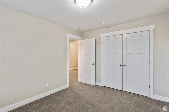 4089 W 1700 N Unit 618, Lehi, UT 84043 - unfurnished bedroom with a closet, carpet flooring, a textured ceiling, and baseboards