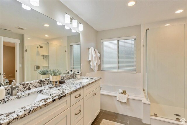 4089 W 1700 N Unit 618, Lehi, UT 84043 - full bathroom with tile patterned flooring, visible vents, a stall shower, and a sink