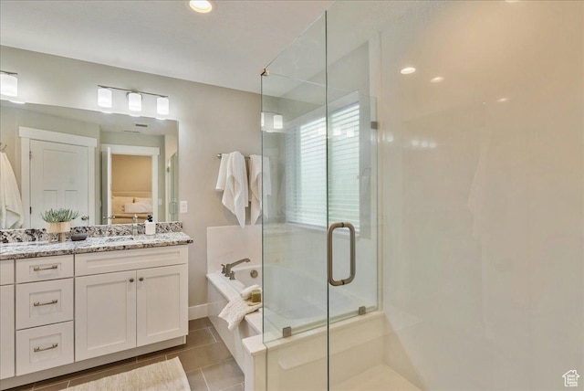4089 W 1700 N Unit 618, Lehi, UT 84043 - bathroom featuring vanity, tile patterned flooring, a shower stall, a garden tub, and connected bathroom