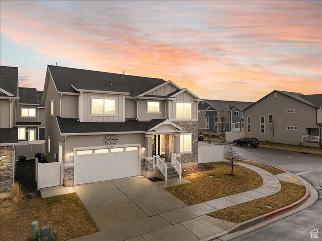4089 W 1700 N Unit 618, Lehi, UT 84043 - multi unit property with stone siding, board and batten siding, and fence