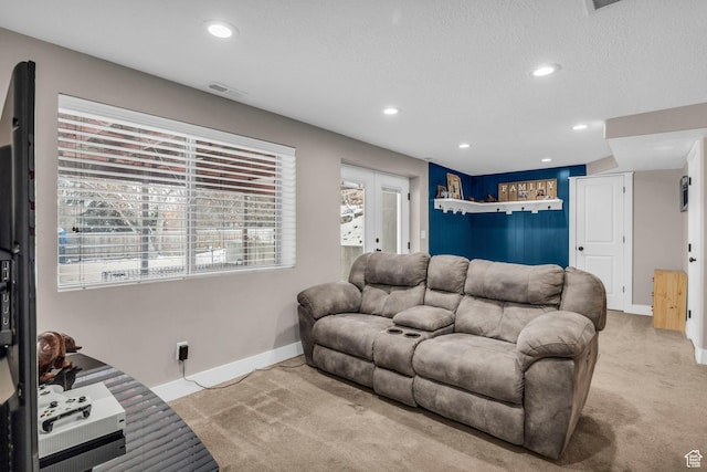 1411 E Elm Leaf Cv, Salt Lake City, UT 84117 - living room with recessed lighting, visible vents, light colored carpet, and baseboards