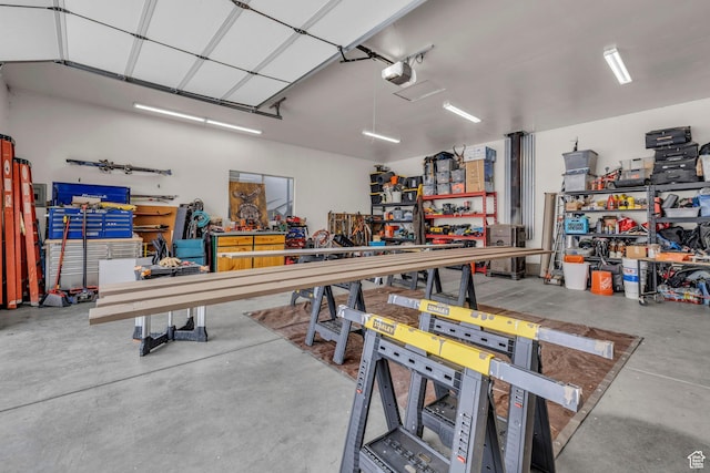 1411 E Elm Leaf Cv, Salt Lake City, UT 84117 - garage with a workshop area and a garage door opener