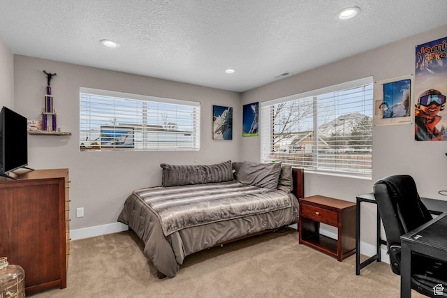 1411 E Elm Leaf Cv, Salt Lake City, UT 84117 - carpeted bedroom with visible vents, recessed lighting, baseboards, and a textured ceiling