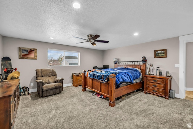 1411 E Elm Leaf Cv, Salt Lake City, UT 84117 - bedroom featuring a textured ceiling, carpet, baseboards, and ceiling fan