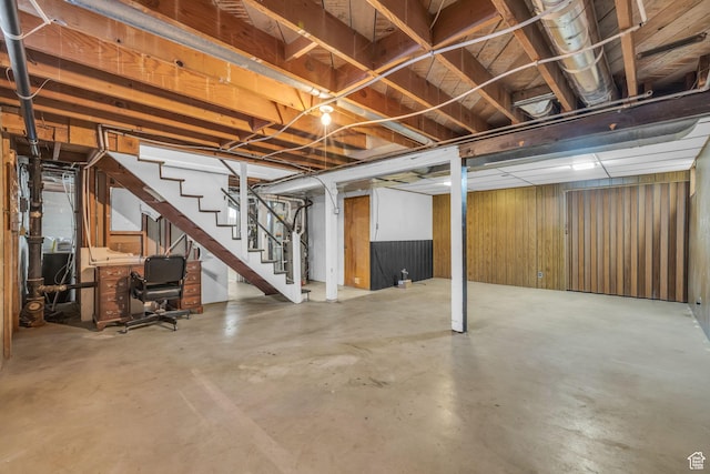 unfinished basement with stairway