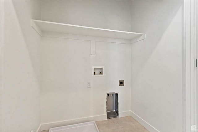 laundry area featuring washer hookup, hookup for an electric dryer, baseboards, and tile patterned floors