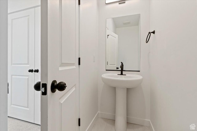bathroom featuring baseboards