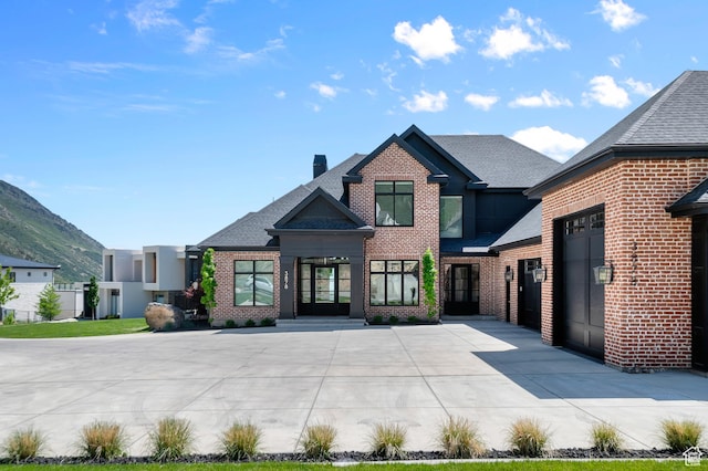 3878 W Oak Hill Dr, Alpine, UT 84004 - view of front facade with brick siding, a shingled roof, and a chimney