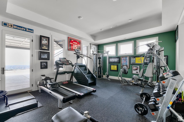 3878 W Oak Hill Dr, Alpine, UT 84004 - workout area with baseboards and a tray ceiling