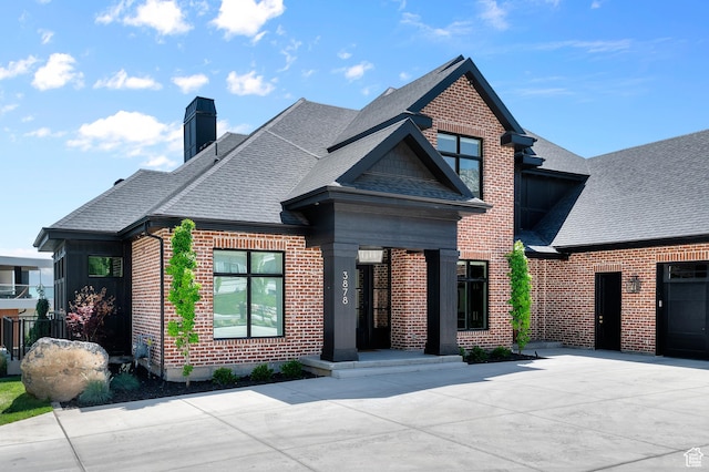 3878 W Oak Hill Dr, Alpine, UT 84004 - view of front of property featuring brick siding, roof with shingles, and a chimney