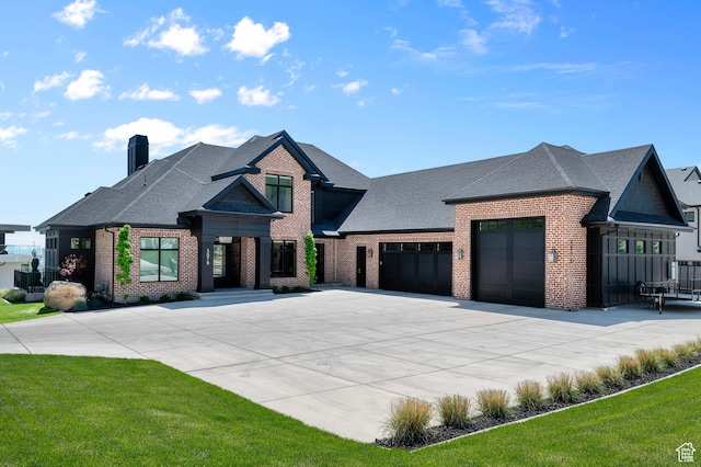 3878 W Oak Hill Dr, Alpine, UT 84004 - view of front facade featuring brick siding, driveway, an attached garage, roof with shingles, and a chimney