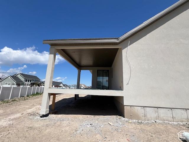 view of patio featuring fence