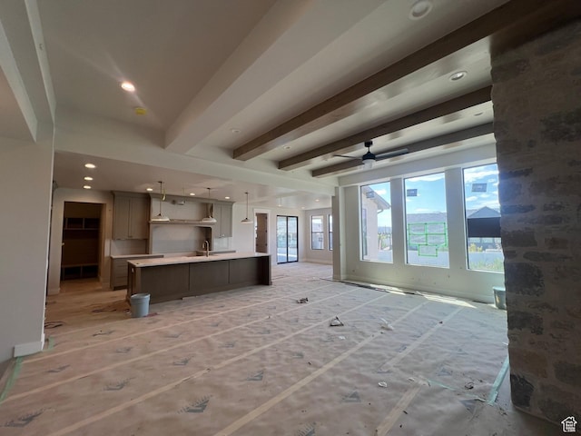 1185 N 2650 W, Lehi, UT 84043 - unfurnished living room featuring beamed ceiling, ceiling fan, and recessed lighting