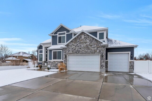 11702 S Water Brook Ct, South Jordan, UT 84095 - craftsman inspired home featuring concrete driveway, a garage, fence, and stone siding