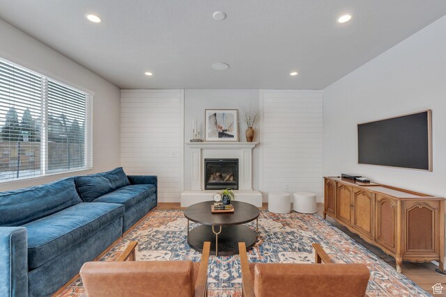 11702 S Water Brook Ct, South Jordan, UT 84095 - living area with recessed lighting, light wood-style flooring, and a glass covered fireplace