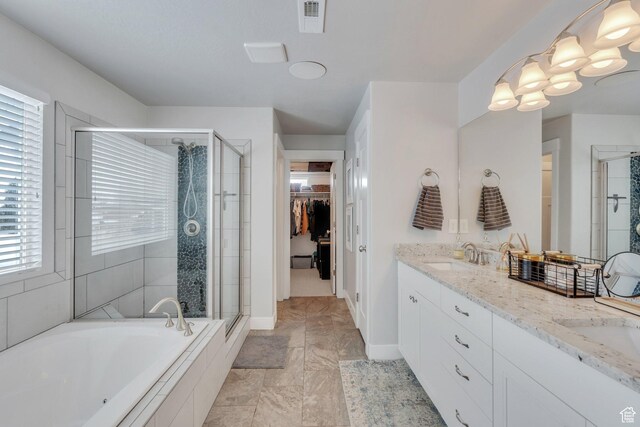 11702 S Water Brook Ct, South Jordan, UT 84095 - full bathroom with visible vents, double vanity, a stall shower, a sink, and a bath