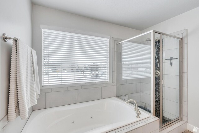 11702 S Water Brook Ct, South Jordan, UT 84095 - full bathroom featuring a shower stall and a tub with jets