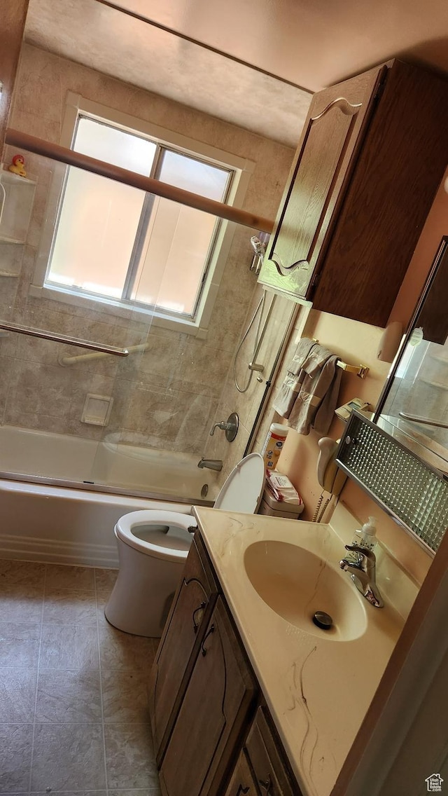 1981 W 3825 S, Roy, UT 84067 - full bath featuring tile patterned floors, toilet, vanity, and combined bath / shower with glass door