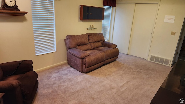 1981 W 3825 S, Roy, UT 84067 - carpeted living room featuring baseboards and visible vents