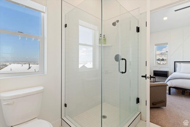 51 E Vantage Dr, North Salt Lake, UT 84054 - ensuite bathroom featuring a shower stall, toilet, and recessed lighting