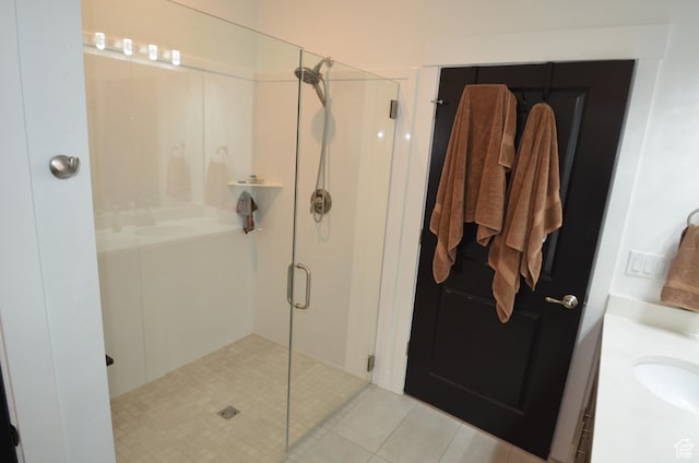 10717 S Haven Vista Dr, South Jordan, UT 84095 - full bathroom featuring tile patterned floors, a stall shower, and vanity