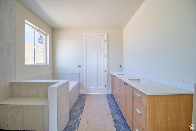 608 E 1310 S, Payson, UT 84651 - full bath with a garden tub, tile patterned flooring, vanity, and a textured ceiling