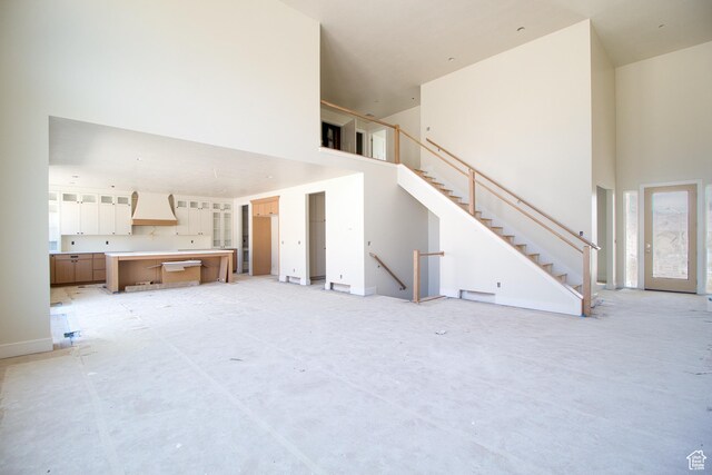 608 E 1310 S, Payson, UT 84651 - unfurnished living room with a towering ceiling and stairs