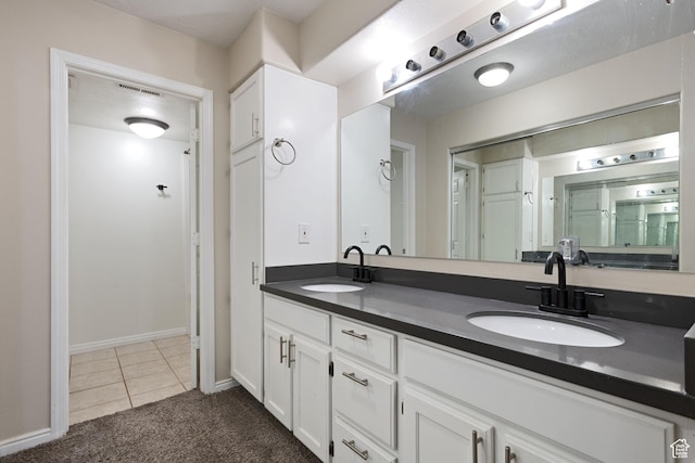 3839 S Canyon River Way Unit 1, South Salt Lake, UT 84119 - bathroom featuring tile patterned floors, visible vents, a sink, and double vanity