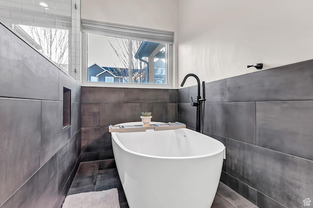 3857 S Windlass Rd W, Saratoga Springs, UT 84045 - full bathroom with a freestanding tub and tile walls