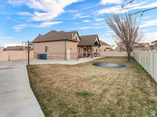 3857 S Windlass Rd W, Saratoga Springs, UT 84045 - view of yard with a patio and a fenced backyard