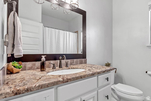 3857 S Windlass Rd W, Saratoga Springs, UT 84045 - bathroom featuring vanity and toilet
