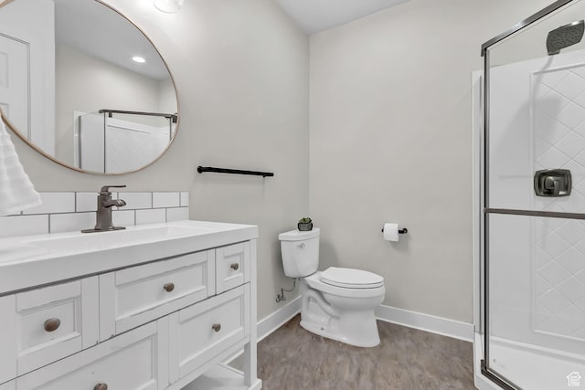 3857 S Windlass Rd W, Saratoga Springs, UT 84045 - bathroom featuring vanity, baseboards, a shower stall, and toilet
