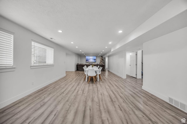 571 S 3350 W, Syracuse, UT 84075 - unfurnished dining area with recessed lighting, visible vents, baseboards, and light wood finished floors