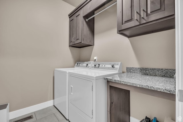 571 S 3350 W, Syracuse, UT 84075 - clothes washing area with visible vents, independent washer and dryer, cabinet space, light tile patterned flooring, and baseboards